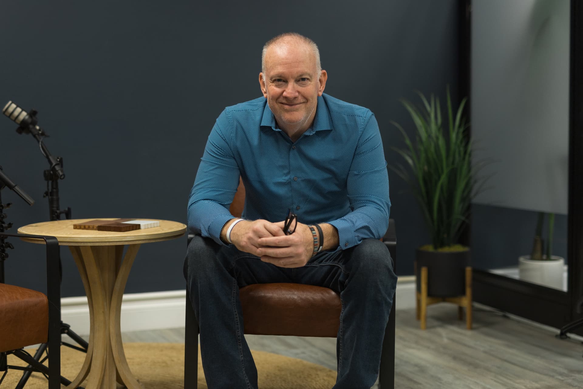 Jeff Mason, founder of Forge Creative AI, seated in the studio